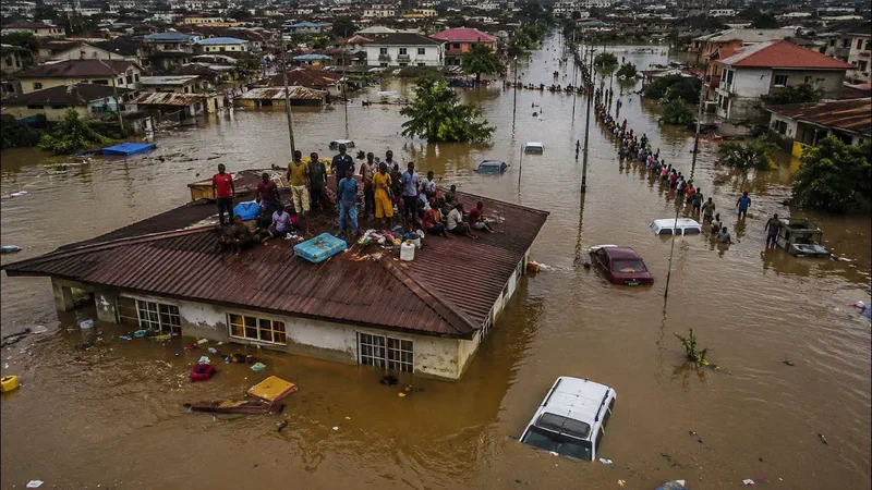 People stranded on rooftops awaiting rescue