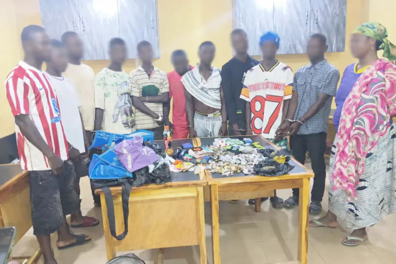 Suspects and seized items at Kintampo Police Command (faces blurred for privacy)