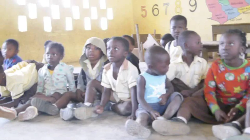 Children seated inside a classroom at Kuren