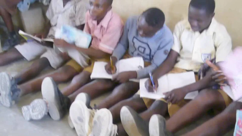 Children seated inside a classroom at Kuren